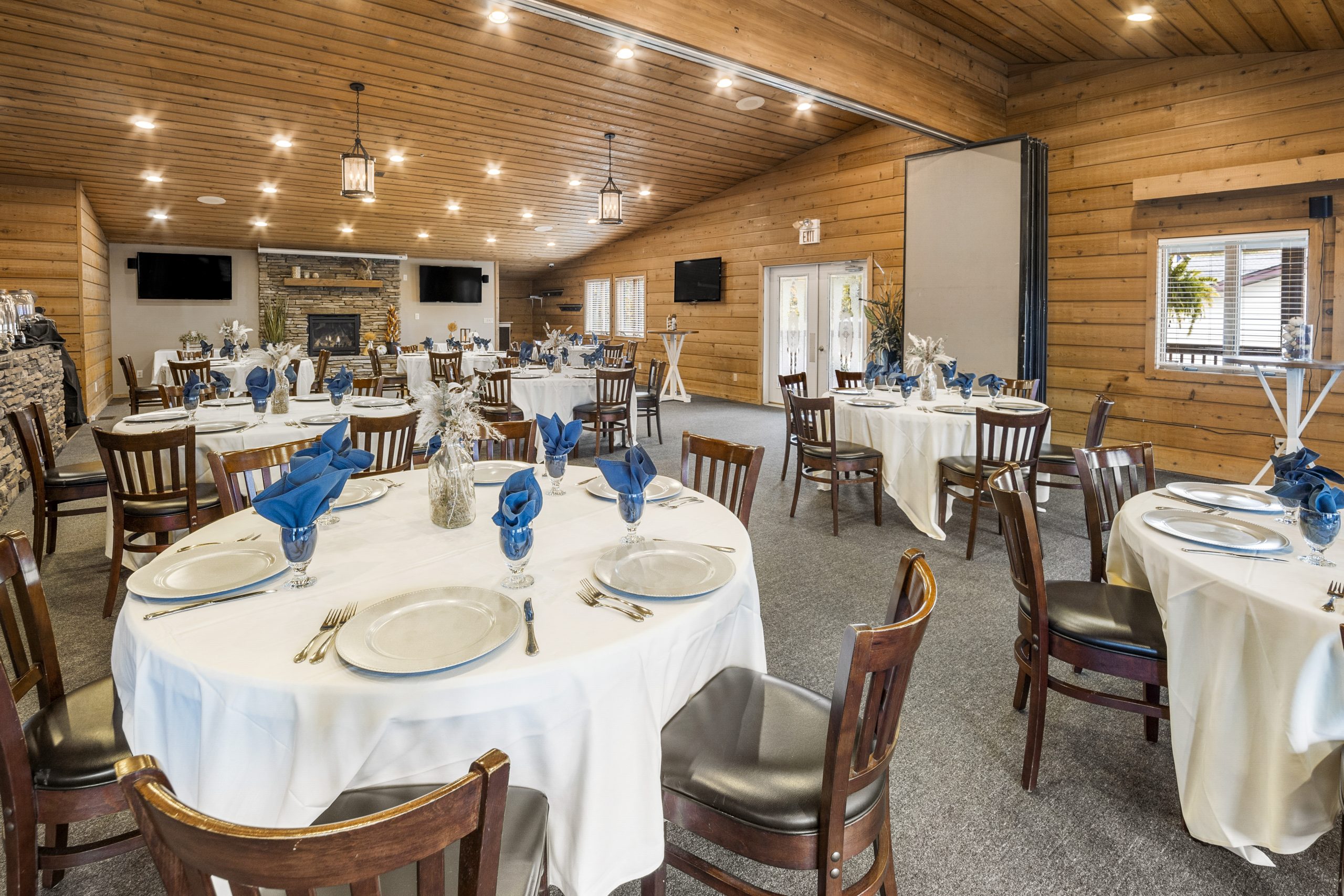Wedding reception tables with place settings in the ballroom