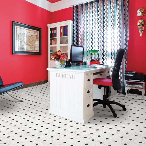 Luxury vinyl plank floor in a room, close and well lit