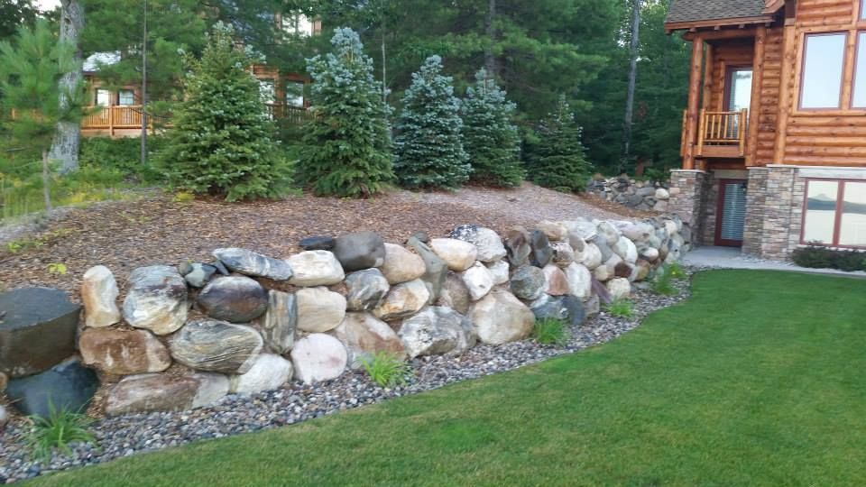 Crew installing hardscape or landscape work on site